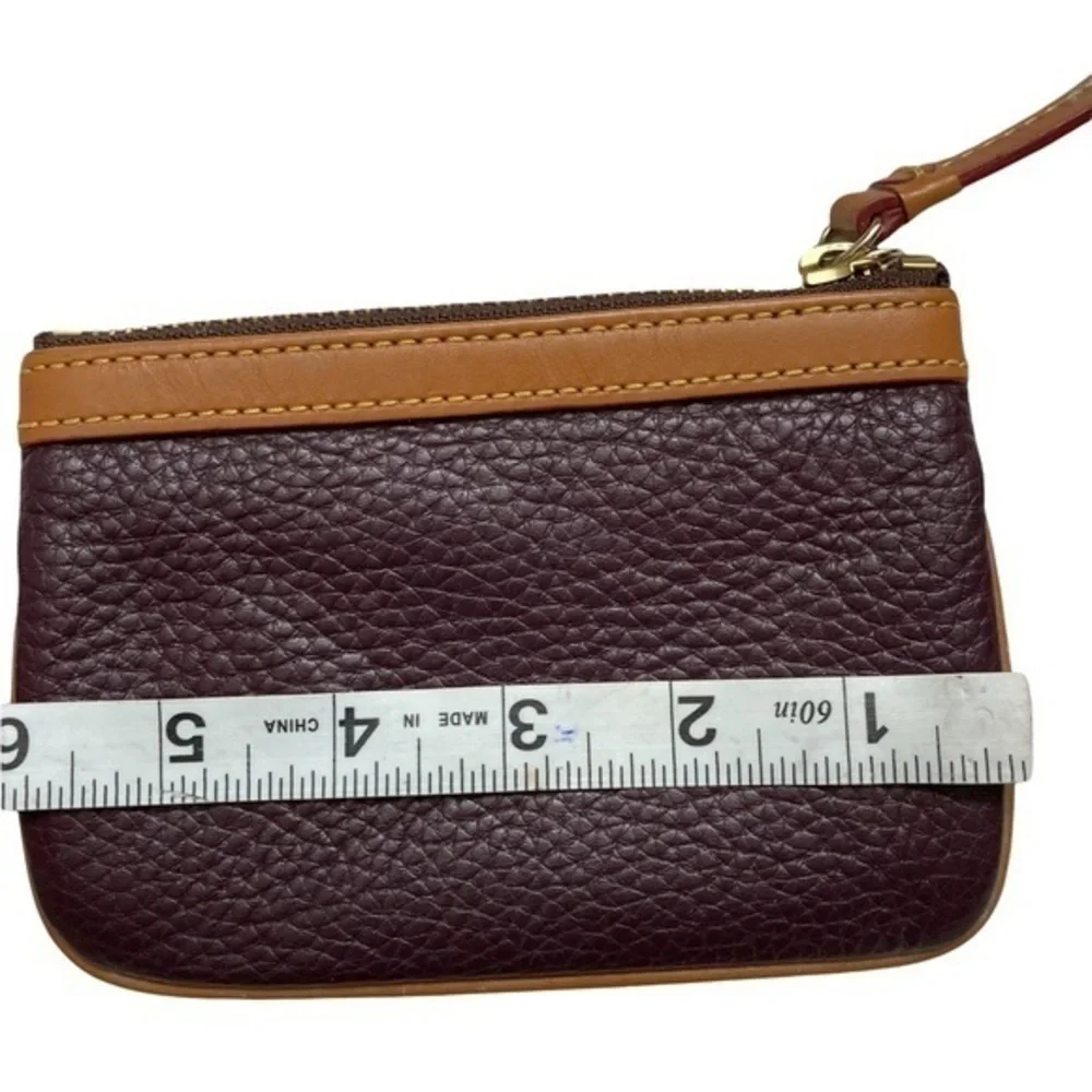 Dooney & Bourke purple and brown leather cosmetic bag